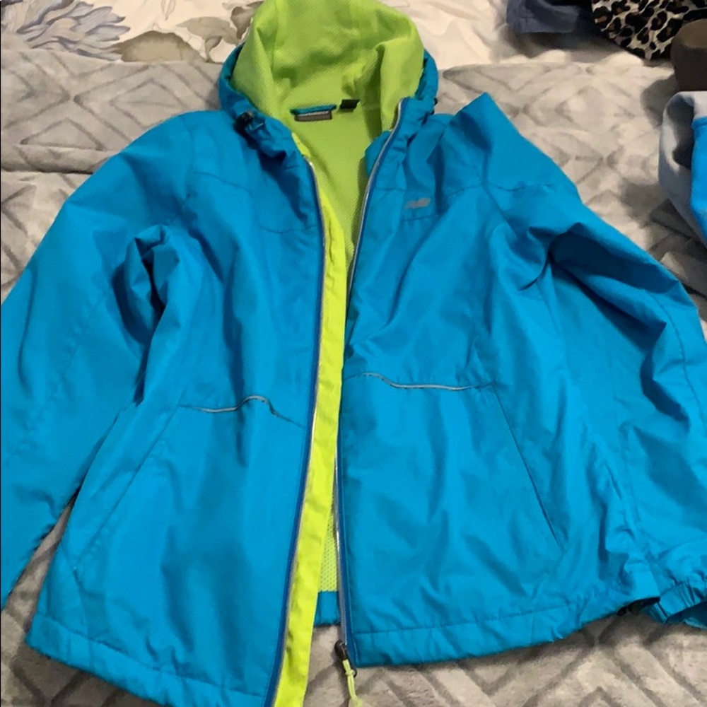 New balance light weight jacket in light blue